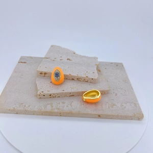 Orange evil eye teardrop necklace pendant with gold plating and blue crystals