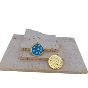 Blue enamel evil eye sun pendant with gold plating and cubic zirconia inlay
