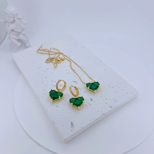 Elegant gold jewelry set with heart-shaped green cubic zirconia earrings and necklace