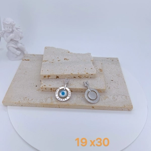 Detailed view of gold-plated evil eye charms with LOVE engraving and size 19x30 mm