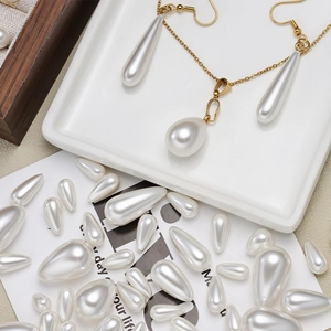 Handmade gold necklace and earrings set with teardrop ABS pearls for DIY jewelry making