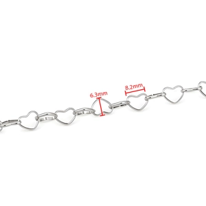 Detail of silver heart-shaped chain links measuring 8.2mm by 6.3mm on white background