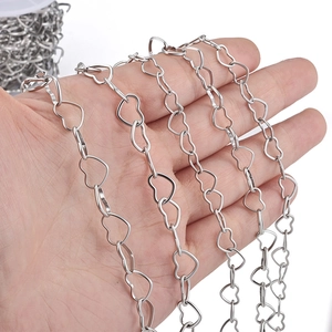 Close-up of durable silver stainless steel heart chain links for DIY jewelry making