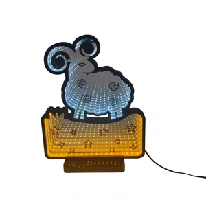 Detail of goat-shaped LED infinity mirror tunnel light with blue and yellow star patterns