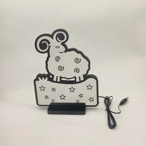 Detail view of cartoon sheep LED tunnel lamp with USB cable and star pattern base