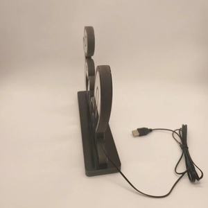 Side view of Mickey Mouse shaped LED tunnel lamp with black base and USB power cable