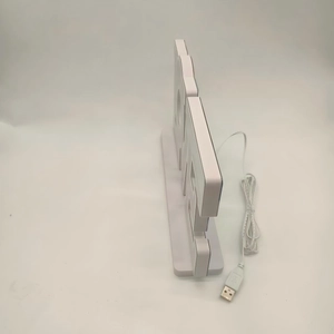 Side view of white 3D LED digital tunnel clock showing thickness and USB cable