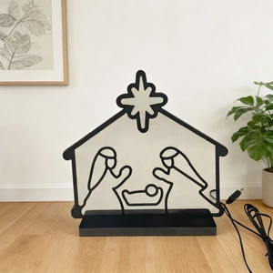 Neon LED Nativity Scene silhouette lamp with USB cable on minimalist wooden floor