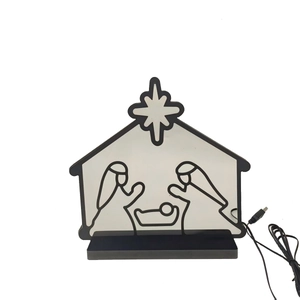 Detail of Jesus nativity scene neon light with black minimalist frame and USB cable