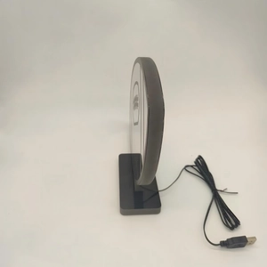 Detail of rugby-style LED atmosphere light showing USB-A power cable and stand