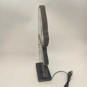 Side view of St. Patrick's Day acrylic night light with black base and power cord