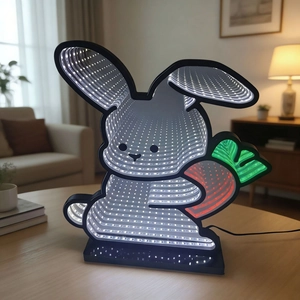 Easter rabbit infinity mirror tunnel lamp with LED lights on a wooden table
