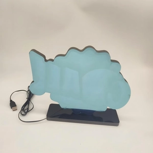 Creative blue fish-shaped LED neon sign with acrylic frame and black USB base stand