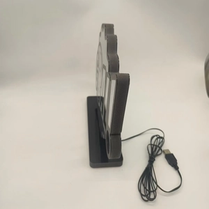 Side view of GOAL LED neon light showing thickness, black frame and USB power cable