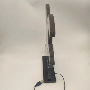 Detailed side view of Snoopy shaped 3D infinity mirror lamp with USB power cable