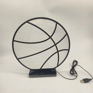 Creative basketball shaped LED desk lamp with black frame and USB power cable