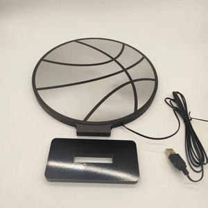 Detail of creative basketball LED light with acrylic panel, base and USB cable