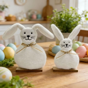 Easter plush bunny pair with silk bows on wooden base for festive tabletop decoration