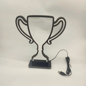 Creative trophy-shaped LED mood light with black acrylic base and USB power cable