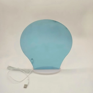 Close-up of creative bulb-shaped acrylic panel with USB light base for DIY message lamp