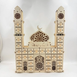 Detail of wooden Ramadan countdown calendar with mosque shape and 30 numbered drawers