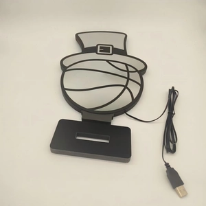 Detail of 3D LED basketball night light with USB cable and black base stand