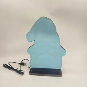 Detail of St. Patrick's gnome infinity mirror neon light with USB cable and black base