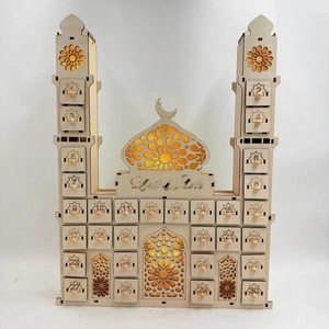 Close-up of wooden Ramadan countdown calendar with mosque shape and 30 small drawers