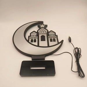 Detail of LED tunnel mirror moon lamp with castle silhouette and USB power cable