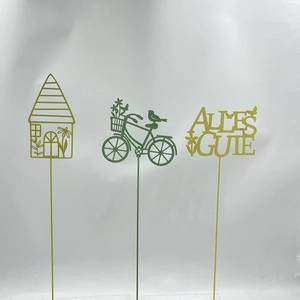 Three-piece green iron garden stakes set featuring bicycle and Alles Gute greetings