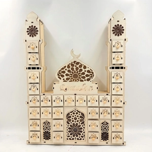 Close-up of wooden Ramadan countdown calendar with 30 laser-cut drawers and moon crest