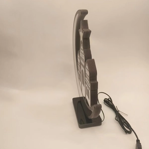 Detail view of crescent moon LED lamp with mosque silhouette and USB power cable