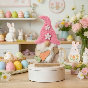 Easter gnome figurine with pink hat and carrot, wooden base tabletop decoration
