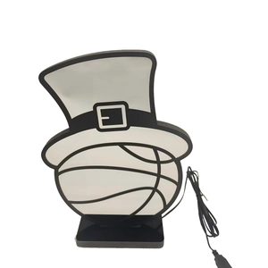 Detail of St. Patrick's Day LED basketball light with green hat and USB power cable