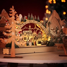Close-up of laser-cut 3D wooden Christmas decor with warm LED lighting and reindeer