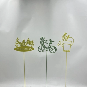 Garden metal decorative stakes set featuring butterfly and bicycle motifs in green finish