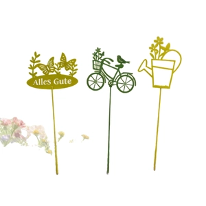 Three-piece metal garden stake set with butterfly, bicycle, and watering can designs