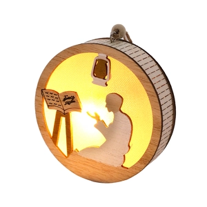 Nordic wooden LED hanging ornament with prayer silhouette and warm glowing light