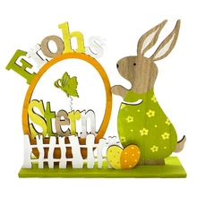 Detailed view of wooden Easter bunny ornament with Frohe Ostern LED cutouts and green base