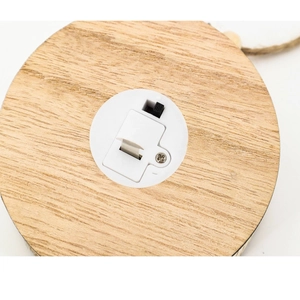 Nordic wooden glowing house ornament with natural wood texture and power switch