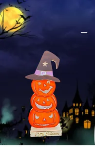 Close-up of wooden triple stacked pumpkin LED light with wizard hat for Halloween decor