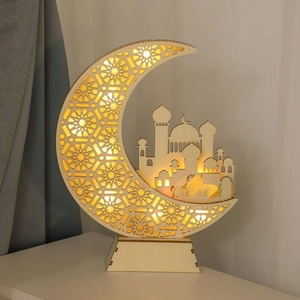 Macro detail of laser-cut wooden moon decoration with warm LED lighting for Ramadan