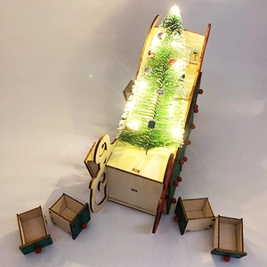 Weihnachts-Adventskalender aus Holz mit LED-Baum und vier grünen Aufbewahrungsschubladen