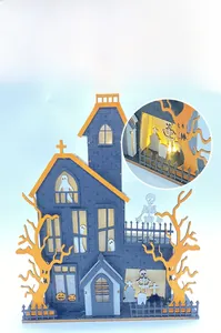 Macro view of a wooden Halloween ghost house LED lamp with spooky cutout details