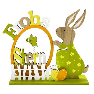 Detail of multi-layered wooden Easter bunny ornament with green eggs and floral patterns