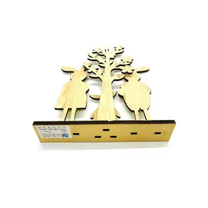 Laser cut wooden bunny and cherry blossom desk ornament with natural plywood texture