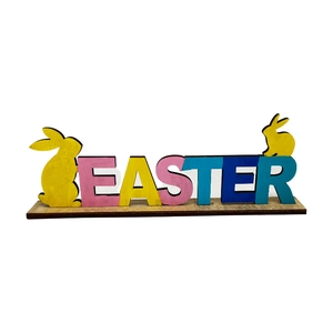 Colorful wooden Easter centerpiece with bunny silhouettes and decorative letter styling