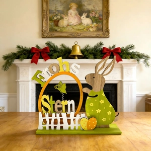 Easter wooden bunny decoration with Froh Stern sign on a rustic tabletop display