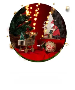 Detail of wooden Santa ornament and miniature cart with festive warm lighting
