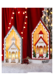 Close-up of wooden Christmas church decoration with LED light and X-mas sign